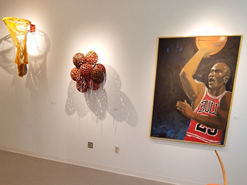 basketball art in the Therese A. Maloney Art Gallery celebrating sports in art