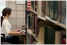 woman studying in the Mahoney Library at SEU